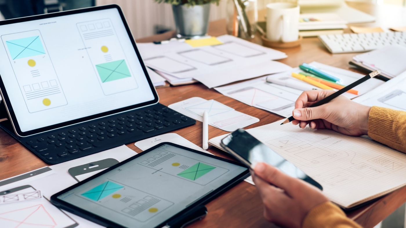 Web design agency image of employee mapping out a website