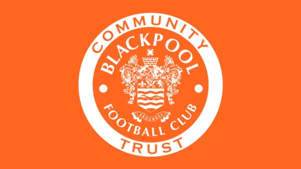 Community Blackpool Football Club Trust logo, a white circular crest with the club's coat of arms, on an orange background.