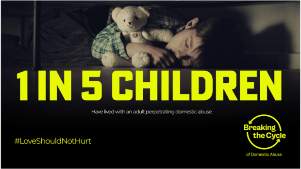 A young child sleeping while hugging a teddy bear, overlaid with text '1 in 5 children have lived with an adult perpetrating domestic abuse' and hashtag #LoveShouldNotHurt, with the Breaking the Cycle of Domestic Abuse logo.