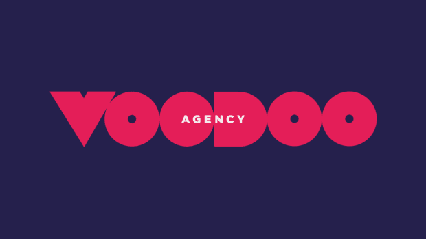 Voodoo Agency logo, with the word 'Voodoo' in bold pink geometric letters and 'Agency' in white text on a dark navy background.